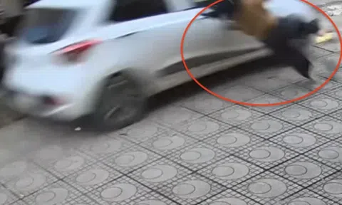 Nữ tài xế ôtô tông văng cô gái trên vỉa hè rồi bỏ đi