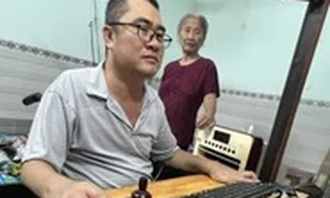 Người cha liệt tứ chi không đầu hàng số phận